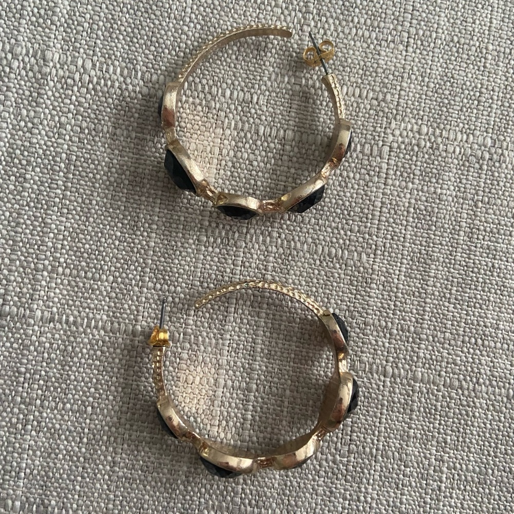 Gold and black statement hoop earrings